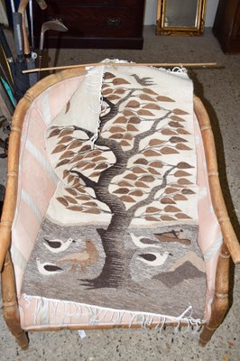 Lot 299 - A wool work wall hanging