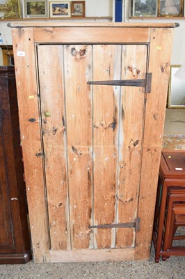 Lot 326 - A 20th Century pine single door cupboard