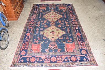 Lot 338 - 20th Century Iranian wool floor rug with large...