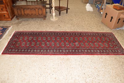 Lot 342 - 20th Century machine made Bokara type runner...