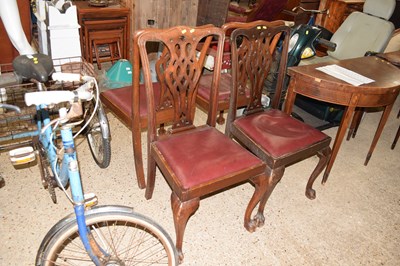 Lot 356 - A set of four Georgian Revival mahogany dining...