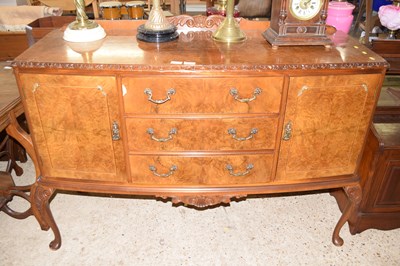 Lot 352 - A walnut veneered bow front sideboard