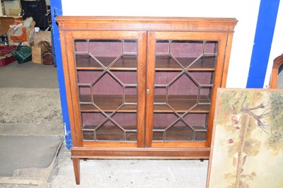 Lot 344 - An Edwardian glazed two door cabinet