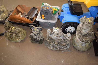 Lot 781 - Four concrete pig ornaments