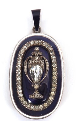 Lot 115 - A Georgian enamelled pendant, the oval pendant...