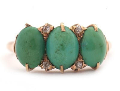 Lot 9 - A turquoise and diamond ring, the three oval...