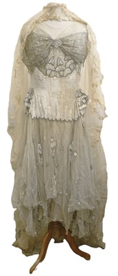 Lot 15 - An early 20th century wedding dress, c. 1930,...