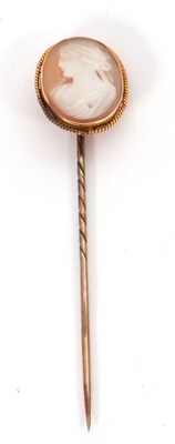 Lot 103 - A 19th century cameo stick pin, the oval shell...