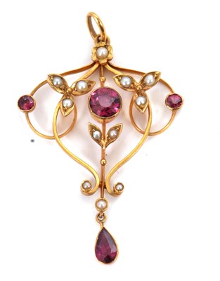 Lot 97 - An Edwardian garnet and seed pearl pendant,...
