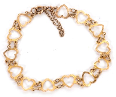 Lot 226 - A 9ct heart bracelet, the heart shape links...