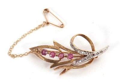 Lot 101 - A 9ct gemset brooch, the open leaf shape...