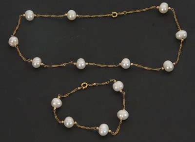 Lot 110 - An 18K plated and cultured pearl necklace and...