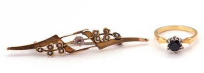 Lot 207 - A gemset ring and a brooch: the ring set with...