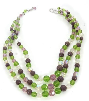 Lot 240 - A Christian Dior necklace, the three strand...