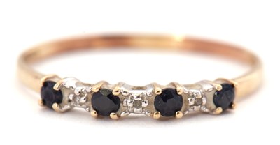 Lot 3 - A sapphire and diamond ring, the alternating...