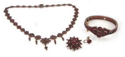 Lot 127 - A 19th century garnet parure, comprised of a...