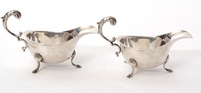 Lot 1 - A pair of George V silver sauce boats of...