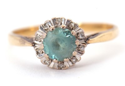Lot 57 - An 18ct blue zircon and diamond ring, the...