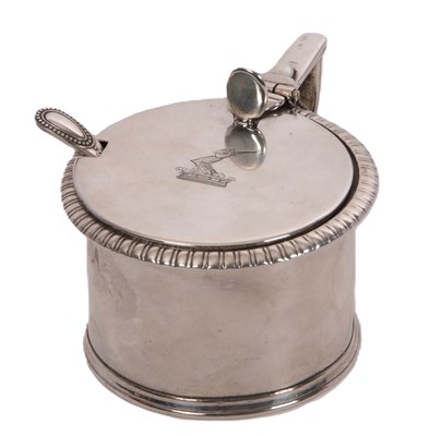 Lot 5 - A George III silver drum mustard pot and liner...