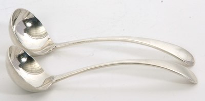 Lot 17 - A pair of George V silver sauce ladles, Old...