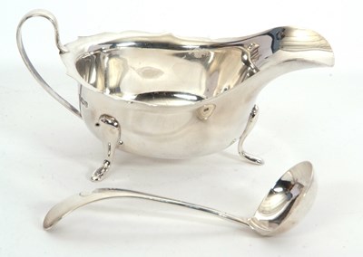 Lot 28 - Mixed Lot: A George Vi silver sauce boat of...