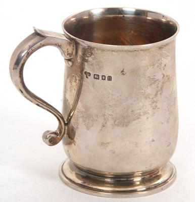 Lot 32 - A George V silver plain tankard of baluster...