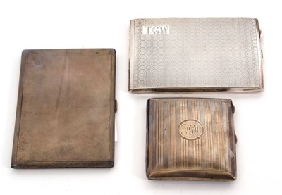 Lot 40 - A group of three silver hallmarked cigarette...