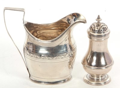 Lot 48 - A George III silver helmet shaped cream jug,...