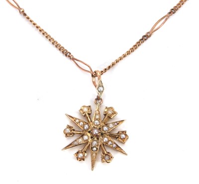 Lot 106 - A seed pearl pendant necklace, the star shape...