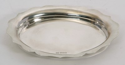 Lot 49 - A hallmarked silver tray of plain oval form...