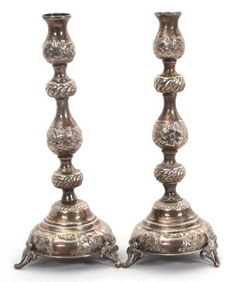 Lot 54 - A pair of George V silver candlesticks of...