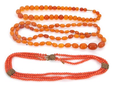 Lot 266 - Three bead necklaces: to include a...