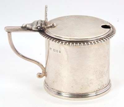 Lot 104 - A George V silver drum mustard pot and blue...
