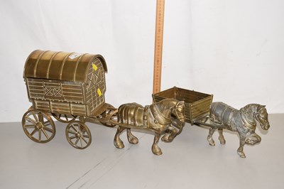Lot 27 - A brass Romany caravan and horse and a further...