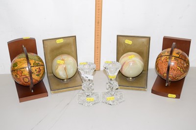 Lot 49 - Two pairs of globe decorated book ends...