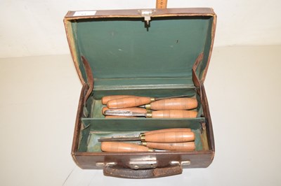 Lot 61 - Small leather case of chisels