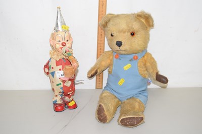 Lot 68 - A vintage clockwork clown and a vintage teddy...