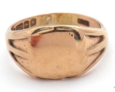 Lot 229 - A 9ct signet ring, the central plain square...