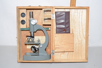 Lot 94 - A cased students microscope