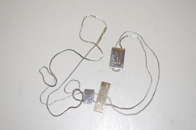 Lot 131 - A Gucci Modernist crucifix and pendant