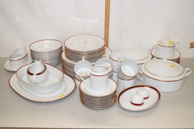 Lot 151 - A Norataki red and gilt rimmed dinner set