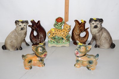 Lot 168 - Mixed Lot: Porcelain dog models, two gurgle...