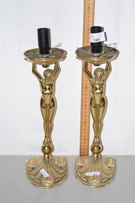 Lot 181 - A pair of brass figural table lamps