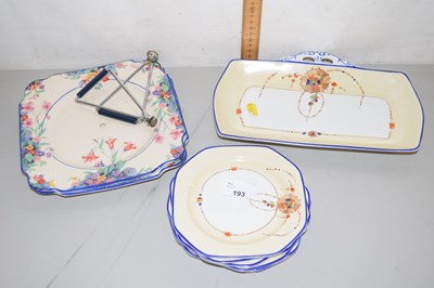 Lot 193 - A floral decorated Art Deco style two tier...