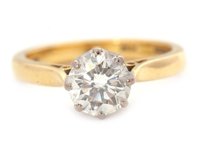 Lot 58 - An 18ct diamond solitaire ring, the round...