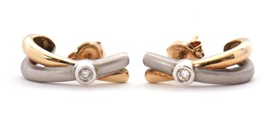Lot 96 - A pair of 9ct bi-colour gold and diamond...