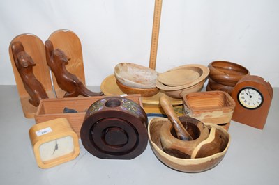 Lot 222 - Group of various turned wooden bowls, bookends...