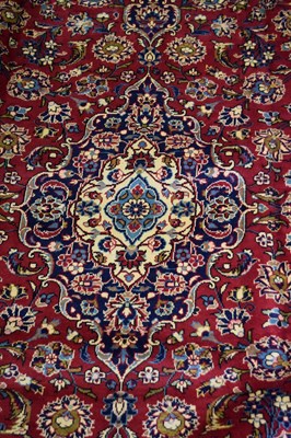 Lot 261 - Large wool Kashan carpet decorated with...