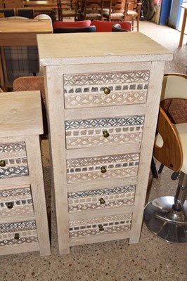 Lot 267 - A pedestal five drawer light wood chest with...