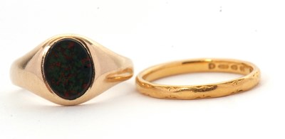 Lot 45 - A 22ct wedding band and a 9ct ring: the...